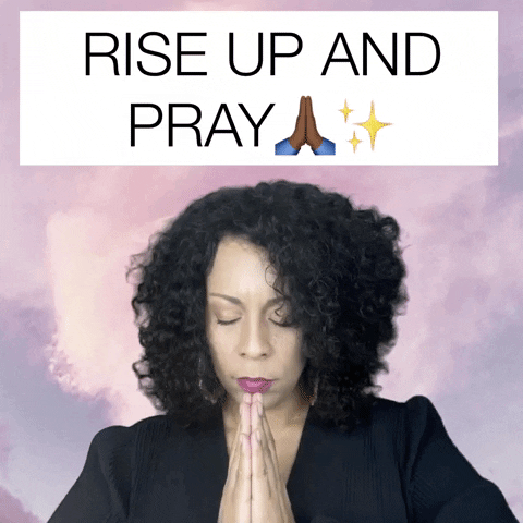 Video gif. Holly Logan is praying with her eyes closed, then opens her eyes and looks straight at us with a serious expression. Text above her reads "Rise up and Pray" along with a black hands praying emoji and a sparkle emoji.