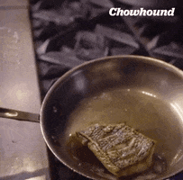 chowhound cooking fish seafood sizzle GIF