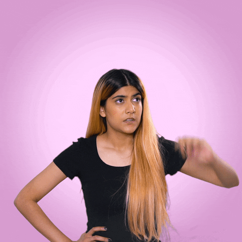 Celebrity gif. Ananya Birla stands with one hand on her hip and the other scratching her head as she looks up, mildly perplexed. Question marks populate the empty space around her.