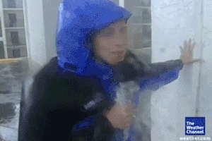 Reporter In Storm GIF