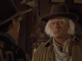 Movie gif. Christopher Lloyd as Doc Brown in Back to the Future squints his eyes and tightens his mouth for a moment, then slowly nods and confidently says "right!"