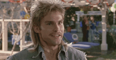Movie gif. Seann William Scott as Peppers from Old School does an excited fist pump and seems to be shouting "yes!"