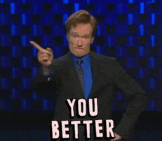 Celebrity gif. With a hand on his hip, a sassy Conan O'Brien bobs his head and waves his finger us and snaps. Text, “You better.”