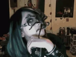 tarantula on a woman's face casually