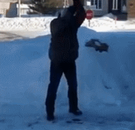shoveling snow angry man hitting shovel against ground GIF