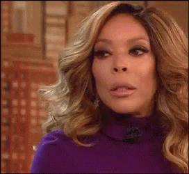 TV gif. An annoyed Wendy Williams looks left of frame as she shakes her head. She gives us a quick knowing look as if to say "can you believe what I have to put up with?", then takes a peaceful sip from a pink mug with her name on it.