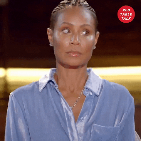 Celebrity gif. Jada Pinkett Smith, eyes wide, points to someone else off-camera, emphasizing that their point must have been a good one.