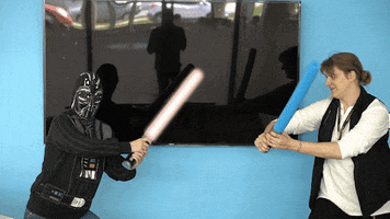 lincolnwoodlibrary fight star wars library jedi GIF