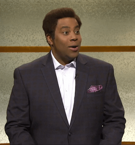 SNL gif. Wearing a dark suit jacket with a purple pocket square, Kenan Thompson looks confused but entertained as he asks: Text, "Who are you people?"