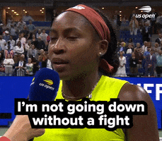 Sports gif. Interview with Coco Gauff after a match as she shrugs her shoulders with an assured expression and says, "I'm not going down without a fight."
