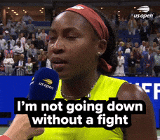 Sports gif. Interview with Coco Gauff after a match as she shrugs her shoulders with an assured expression and says, "I'm not going down without a fight."