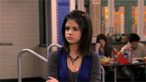 suspicious selena gomez GIF