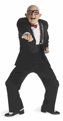 Video gif. A senior man in big black glasses and a tux stands with his legs wide as his mouth hangs open and he punches with alternating arms.