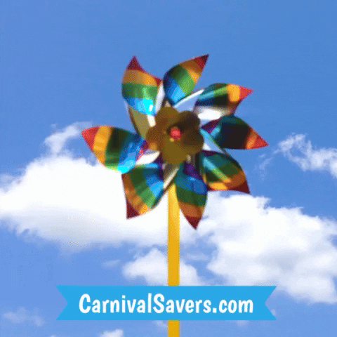 CarnivalSavers carnival savers rainbow pinwheel blowing in the breeze pinwheel prize pretty pinwheel blue sky GIF