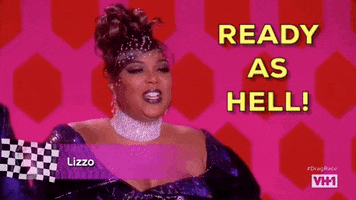 Reality TV gif. Lizzo on RuPaul's Drag Race with an updo and wearing a sparkling cuff collar, saying, "ready as hell."