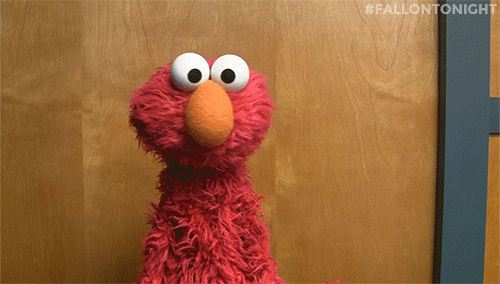 TV gif. Elmo from Sesame Street tilts his head and shrugs as if to say, "I dunno."