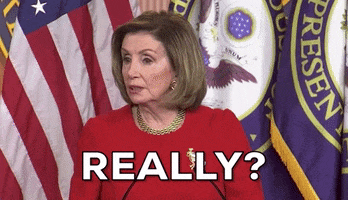 Political gif. Nancy Pelosi stands at a podium in front of flags and asks in surprise "Really?"