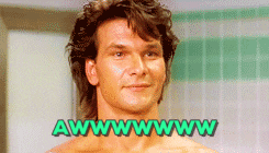 Movie gif. Shirtless Patrick Swayze, as John in Road House, smiles and bashfully bows his head. Text, "awwww."