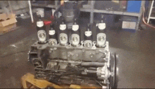 artworkofarmies 6 bottles on an engine block GIF