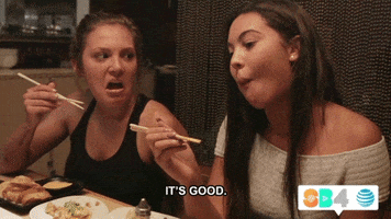 TV gif. Kaylee and Zoe from Summer Break, holds chopsticks. Kaylee stares at Zoe disgusted, her mouth open as Zoe chews. Text, "It's good."
