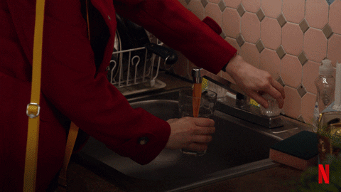Kimmy Schmidt Drinking GIF by Unbreakable Kimmy Schmidt - Find & Share on GIPHY