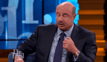TV gif. Dr. Phil sits on stage, closing his eyes as if he heard something unbelievable. He shakes a little bit, his mind blown, and steadies himself with his arms out. He blinks fast as he processes what he just heard.