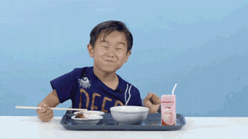 Asian Kid Eating