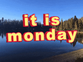 Text gif. Against a peaceful scene of a woodsy lake, the text "it is Monday" rocks back and forth.