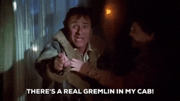 dick miller theres a real gremlin in my cab GIF