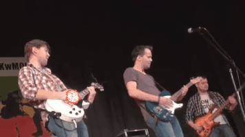 rafakozowicz fire rock guitar concert GIF