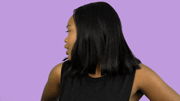 Celebrity gif. Charm LaDonna looking sideways and then snapping forward as if to say, "what?"