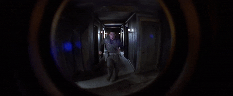 jim carrey the cable guy peephole GIF
