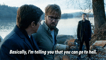 TV gif. Joshua Leonard as James Finnigan in Bates Motel sits next to another character by a lake and tells them sternly, “Basically, I’m telling you that you can go to hell,” which appears as text.