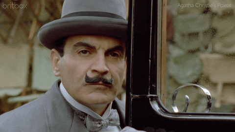 Gif of Poirot looking pensive
