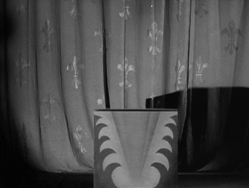 black and white film horror vintage halloween GIF