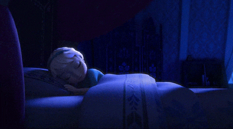 Anna is sneaking beside the bed while Elsa is sleeping