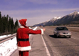 hitchhiking santa claus GIF