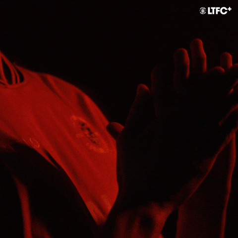 Rubbing Orange Light GIF by Luton Town FC