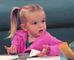 TV gif. Mia Talerico as Charlie from Good Luck Charlie shrugs with a bewildered look on her face. Her blonde pigtails swing from side to side as she turns her head.