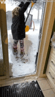 Woman Slips While Shoveling Snow GIF by ViralHog