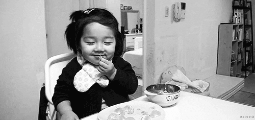  girl eating asian child GIF