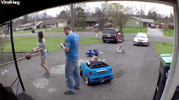 Child Sneaks Up On Dad With Toy Car GIF by ViralHog