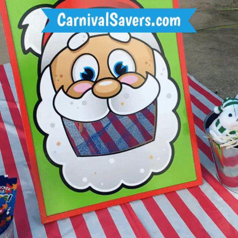 CarnivalSavers carnival savers carnivalsavers santa bean bag toss santas cookies game GIF