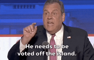 Video gif. Chris Christie raises his eyebrows and gestures like he's following something down, looking a bit intense. Text, "He needs to be voted off the island."