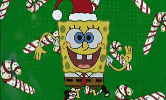 SpongeBob gif. SpongeBob wears a Santa Claus hat and dances, wiggling his legs and arms. He has a goofy smile on his face. The background changes from presents, to candy canes, to bells, Christmas presents, and then snowflakes.