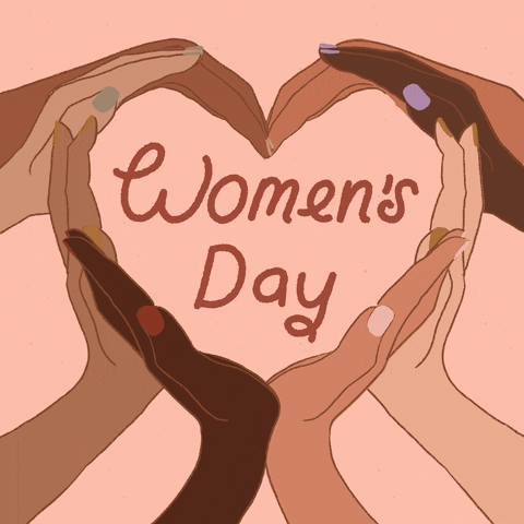 Illustrated gif. Eight hands of varying skin tones form the shape of a heart. Text at the center of the heart reads "Women's Day."