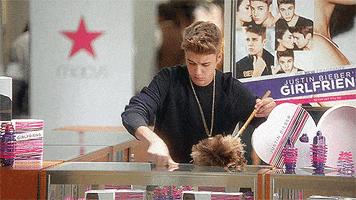 justin bieber cleaning GIF
