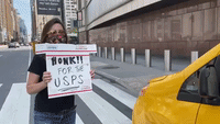 New York Taxi Drivers 'Honk for USPS' During Nationwide Rallies