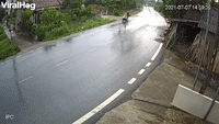 Speeding Truck Tips Over on Slippery Road