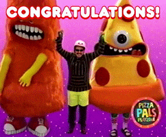Video gif. A man with sunglasses and a helmet jumps up while pumping his fists to celebrate. He is surrounded by two mascot creatures. One is a pepperoni pizza with one eye and two tongues, and it runs in place. The other looks like a big mozzarella stick with long teeth and dangling yellow arms that stomps its feet. 